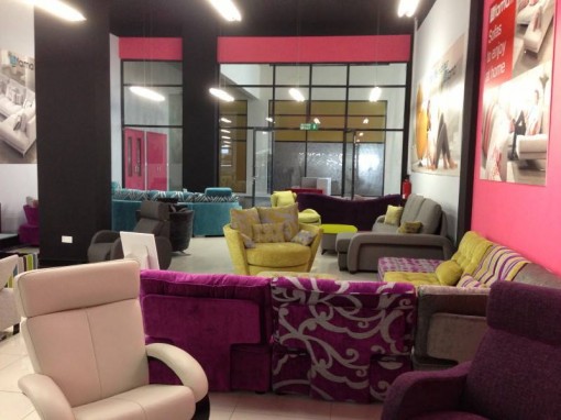 Another view of the interior of the ARTISAN FURNISHING LIMITED showroom with FAMA's products on display