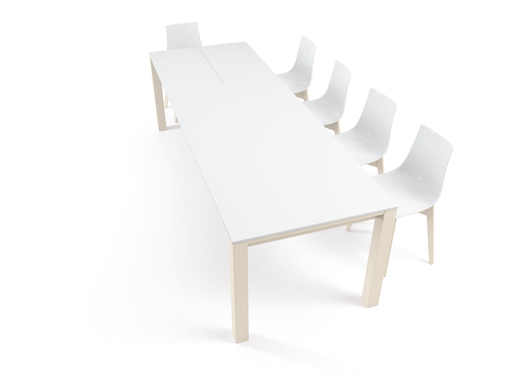 The QUADRA table with FANTASY chairs in a combiantion of white laminate worktop, White polycarbonate seat and bleached wood legs