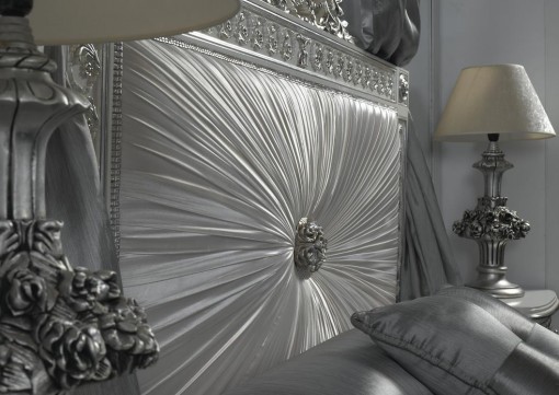 Detail of the precious upholstered headboard and carving of GALAXY bedroom, a design of Concha Ochoa for ESTILO DECORARCHER