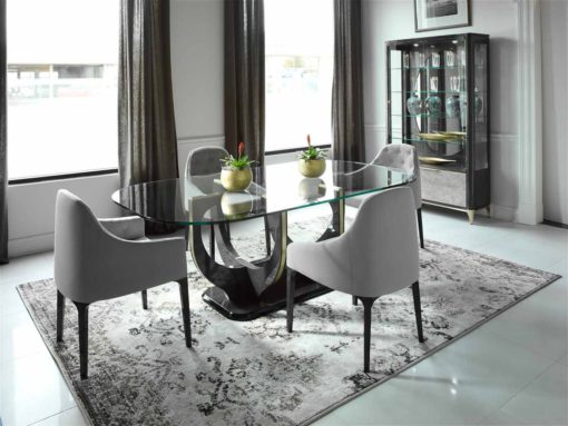 The SOHO dining set with a refined glass top table and the new display cabinet